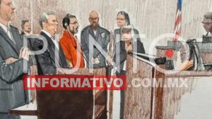 Encadenado y de pie, así se rindió Ovidio Guzmán ante las autoridades de EU